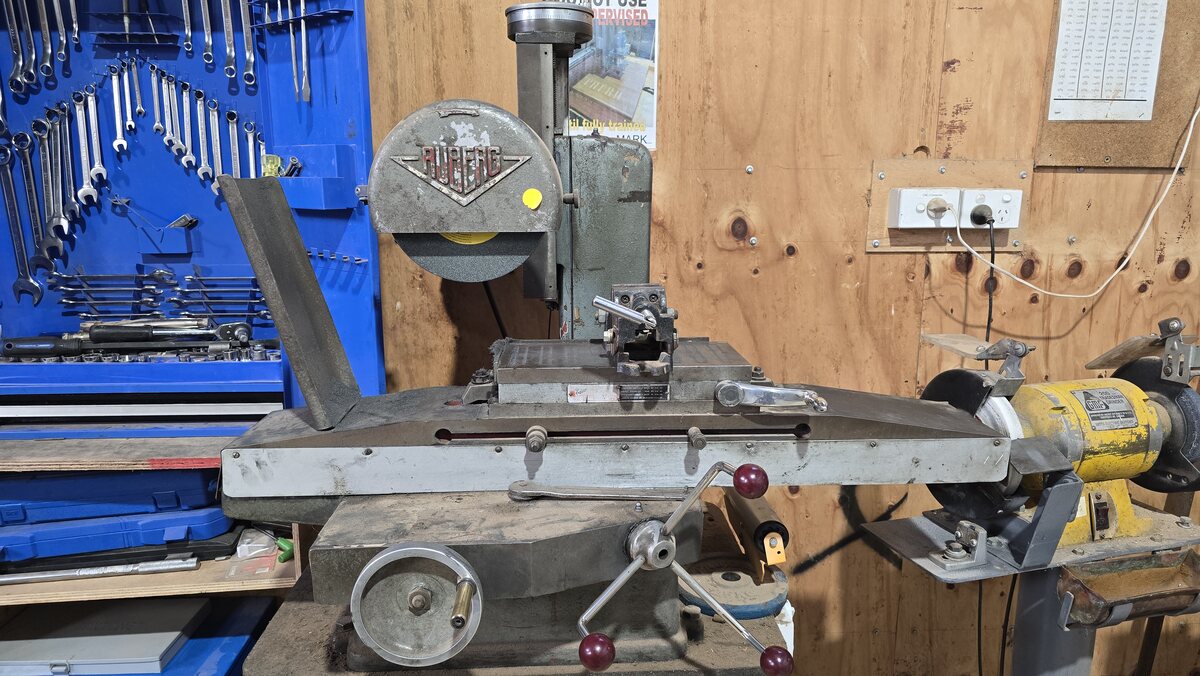 The surface grinder at the shed